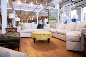 creme sectional sofa and love seat at Green Front Furniture