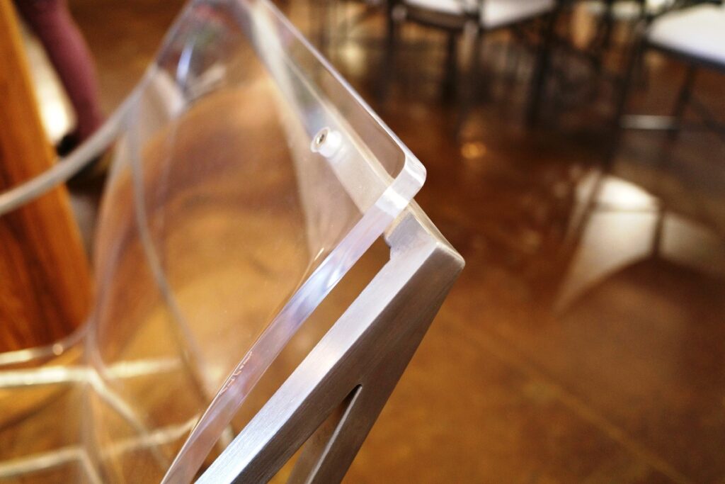 Acrylic Chair in Green Front Furniture showroom