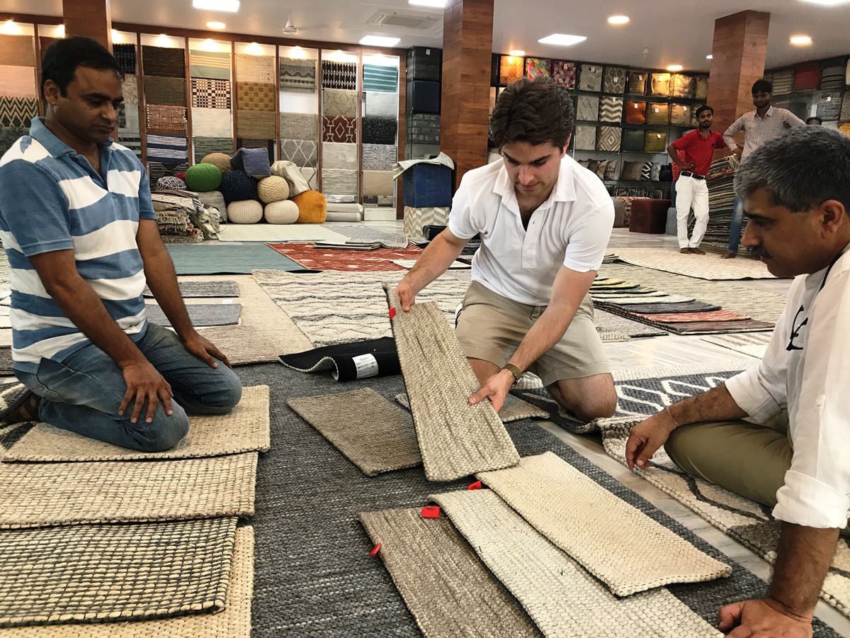 examining rugs