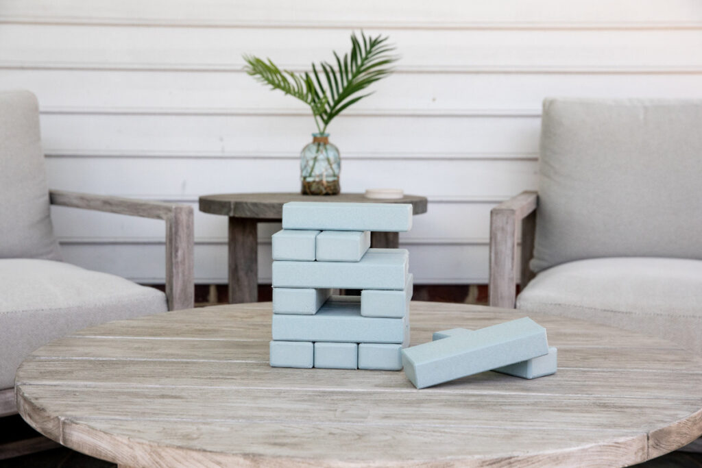 jenga blocks on outdoor furniture table