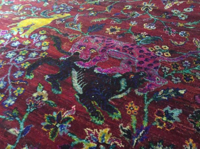 rug pattern with pink leopard attaching other leopard